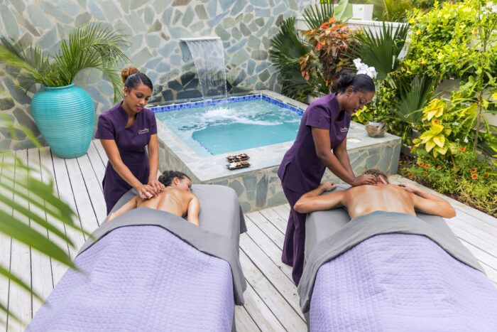 Serenity_Room_CoupleB_Massage_In-Room_Smile_RGB Enjoy Luxury Spa Services from the Comfort of Your Private Suite